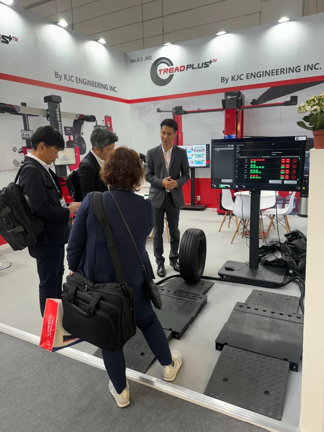 Visitors reviewing TreadPlus equipment at Automechanika Frankfurt 2024