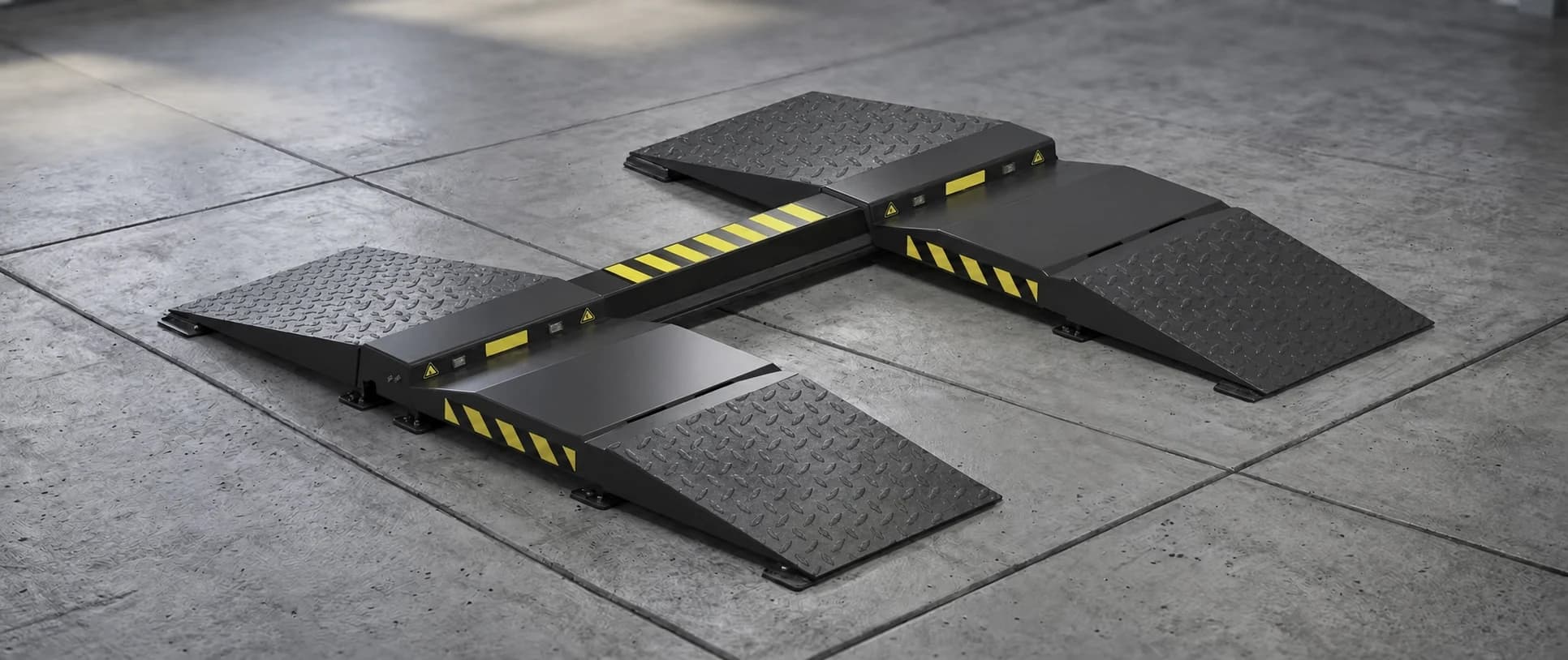 TreadPlus TA100 SMT drive-over tread depth scanner in a workshop lane